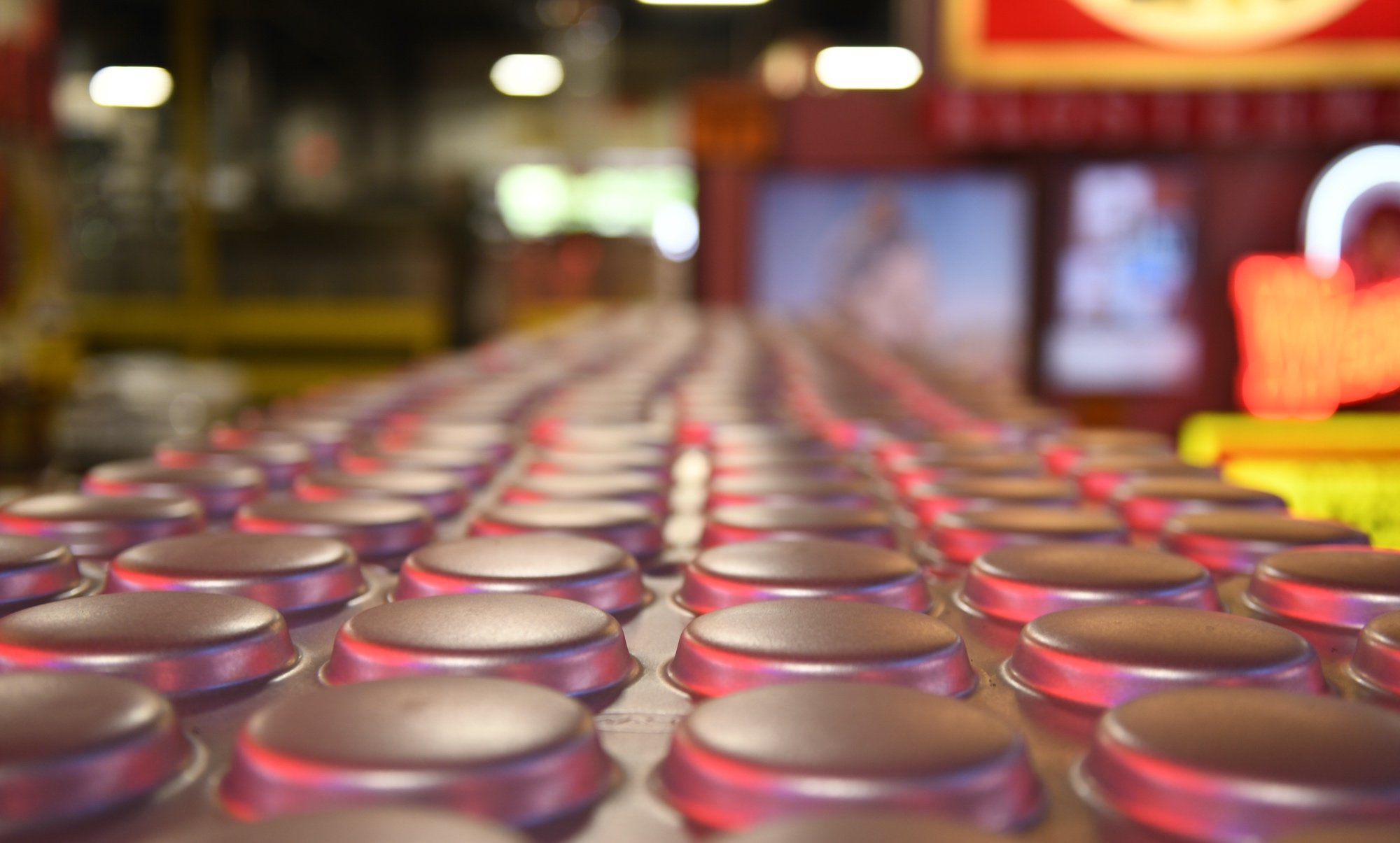 Chicago Metallic Pans under the neon lights at Bundy Baking Solutions